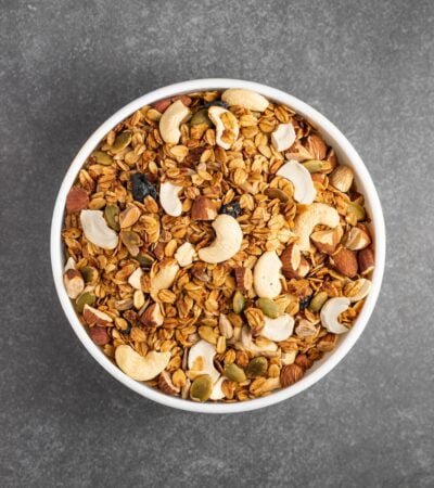 brown peanuts in white ceramic bowl