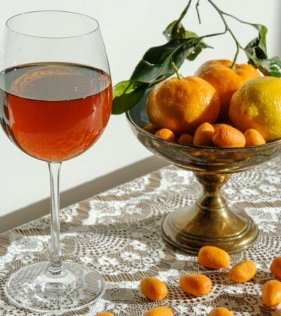 clear wine glass with red liquid inside