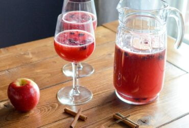 apple juice beside cinnamon