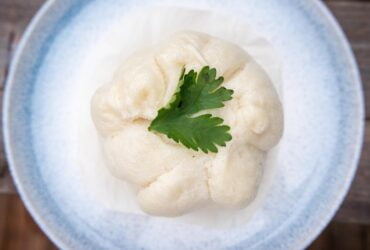 green leaf on white ceramic plate