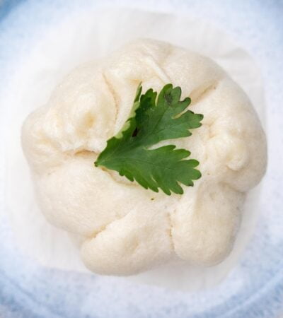green leaf on white ceramic plate