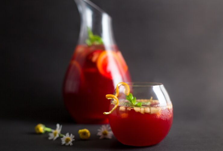 clear drinking glass with red liquid
