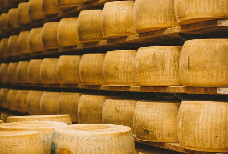 a group of white containers with brown powder on them