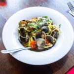 vegetable salad on white ceramic bowl