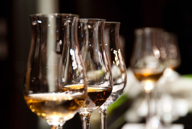 shallow focus photography of clear champagne glass