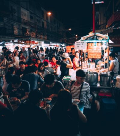 people eating on street