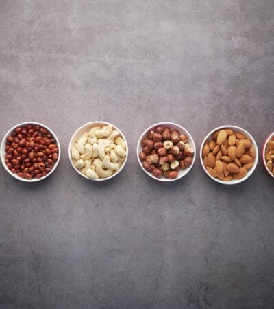 brown nuts on white ceramic bowls